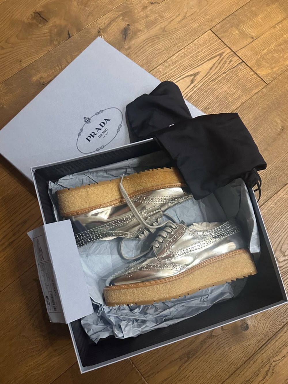 Prada Metallic Silver Wingtip Platform Loafers